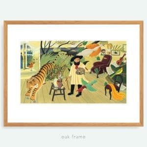 “Tiger in a Tropical Storm” print in oak frame. Gold and green wall art showing Henri Rousseau in his studio a tiger crawling out of his painting.